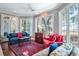 Walls of windows provide great lighting to this comfortable sun room at 762 Wraggs Ferry Rd., Georgetown, SC 29440