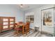 Cozy dining area with wood table, flooring and natural light at 850 Fairway Dr. # 1003Ee, Longs, SC 29568