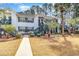 Inviting two-story townhouse with a well-maintained lawn and mature landscaping at 850 Fairway Dr. # 1003Ee, Longs, SC 29568