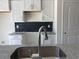 Granite countertop and stylish backsplash create a focal point in this modern kitchen. Ideal for cooking and entertaining at 8545 Pee Dee Hwy., Conway, SC 29527