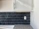 Kitchen featuring dark tile backsplash and granite countertops at 8545 Pee Dee Hwy., Conway, SC 29527