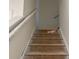 View up carpetless stairs with railing at 8545 Pee Dee Hwy., Conway, SC 29527
