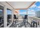 Balcony with seating overlooking the beach at 900 N Waccamaw Dr. # 203, Garden City Beach, SC 29576