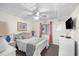 Tranquil bedroom with coastal decor, featuring a queen bed and dresser at 900 N Waccamaw Dr. # 203, Garden City Beach, SC 29576