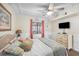 Inviting bedroom with a queen bed, coastal artwork, and comfortable furnishings at 900 N Waccamaw Dr. # 203, Garden City Beach, SC 29576