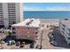 Coastal condos boast ocean views, private balconies, and convenient parking near pristine beach access at 900 N Waccamaw Dr. # 203, Garden City Beach, SC 29576