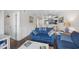 Living room with seating and access to the kitchen area at 900 N Waccamaw Dr. # 203, Garden City Beach, SC 29576
