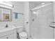 A crisp, all-white bathroom featuring a sink and walk-in shower at 9501 Shore Dr. # D-132, Myrtle Beach, SC 29572