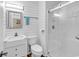 Modern bathroom with a glass shower, shiplap walls, and updated fixtures at 9501 Shore Dr. # D-132, Myrtle Beach, SC 29572