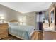 Cozy bedroom features a comfortable bed, soft lighting, and ample closet space at 9501 Shore Dr. # D-132, Myrtle Beach, SC 29572