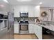 Updated kitchen featuring granite countertops, stainless steel appliances, and ample cabinet space at 9501 Shore Dr. # D-132, Myrtle Beach, SC 29572