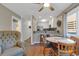 Bright kitchen with stainless steel appliances and breakfast bar open to the dining area at 9501 Shore Dr. # D-132, Myrtle Beach, SC 29572