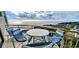Relaxing ocean view from a private balcony with stylish outdoor furniture at 101 Ocean Creek Dr. # Mm-5, Myrtle Beach, SC 29572