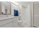 Bathroom with a granite-topped vanity, modern mirror, and a standalone shower at 101 Ocean Creek Dr. # Mm-5, Myrtle Beach, SC 29572