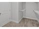 Walk-in closet with shelving and ample storage space, carpeted floor at 1204 Nw Calabash Station Blvd., Calabash, NC 28467