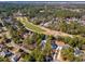 Expansive aerial view showcasing a golf course community with lush greenery and upscale homes at 144 Springfield Rd., Pawleys Island, SC 29585