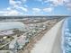 Scenic aerial view capturing the coastline, waterfront properties, and the beautiful beach at 1581 S Waccamaw Dr. # 402, Garden City Beach, SC 29576