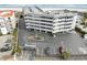 Multi-level condo building near the beach with ample parking and meticulous landscaping at 1581 S Waccamaw Dr. # 402, Garden City Beach, SC 29576