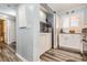 A combined laundry and utility area with modern appliances and fixtures in a stylish design at 1581 S Waccamaw Dr. # 402, Garden City Beach, SC 29576