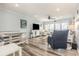 Bright living area with modern flooring and coastal decor, perfect for relaxation and entertainment at 1581 S Waccamaw Dr. # 402, Garden City Beach, SC 29576