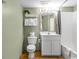 Cozy full bathroom featuring a vanity, mirror, toilet and shower/tub combo at 1706 S Ocean Blvd. # 1001, North Myrtle Beach, SC 29582