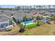 Aerial view of a beautifully landscaped backyard featuring a private pool, enhancing the home's appeal at 2005 Silver Island Way, Murrells Inlet, SC 29576