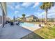 Spacious backyard featuring a sparkling pool, patio area, and lush landscaping, ideal for outdoor living at 2005 Silver Island Way, Murrells Inlet, SC 29576