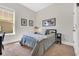 Comfortable bedroom featuring carpet, neutral tones, natural light and simple decor at 2005 Silver Island Way, Murrells Inlet, SC 29576
