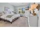 Bedroom with carpet, a large window, and a TV at 2005 Silver Island Way, Murrells Inlet, SC 29576