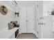 Bright entryway with seating, storage, and double doors at 2005 Silver Island Way, Murrells Inlet, SC 29576