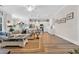 Spacious living room with an open floor plan, seamlessly connecting the kitchen and dining areas at 2005 Silver Island Way, Murrells Inlet, SC 29576