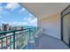 Relaxing balcony view with seating overlooking the ocean and nearby buildings at 201 74Th Ave. N # 703, Myrtle Beach, SC 29572