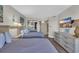 A bedroom with neutral walls features two beds and mirrored closet doors at 201 74Th Ave. N # 703, Myrtle Beach, SC 29572