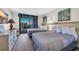 Inviting bedroom features two beds and ocean views from the private balcony at 201 74Th Ave. N # 703, Myrtle Beach, SC 29572