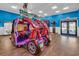 Bright and fun game room featuring racing games, arcade games, and ample space for entertainment at 201 74Th Ave. N # 703, Myrtle Beach, SC 29572