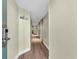 Bright hallway with wood floors leading to the living areas of the condominium at 201 74Th Ave. N # 703, Myrtle Beach, SC 29572