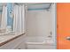 Bathroom featuring granite-topped vanity and soaking tub with shower at 201 S Ocean Blvd. # 217, Myrtle Beach, SC 29577