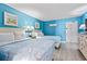 Bright bedroom with two beds, beach-themed decor, comfortable lighting, and ample space at 201 S Ocean Blvd. # 217, Myrtle Beach, SC 29577