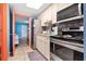 Well-equipped kitchen adjacent to the bedroom, featuring stainless steel appliances and ample cabinet space at 201 S Ocean Blvd. # 217, Myrtle Beach, SC 29577