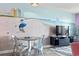 Living room featuring a mural of a beach and view of the ocean at 201 S Ocean Blvd. # 217, Myrtle Beach, SC 29577