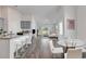 Bright living room with modern decor, featuring wood floors, stylish furniture, and lots of natural light at 205 Kinross Ct., Little River, SC 29566