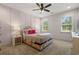 Charming bedroom with a floral bedframe, soft lighting, and a serene ambiance at 208 Green Lake Dr., Myrtle Beach, SC 29572