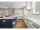 Well-appointed kitchen featuring stainless steel appliances, a large island, and an abundance of counter space at 208 Green Lake Dr., Myrtle Beach, SC 29572