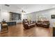 Spacious living room featuring built-in shelves, comfortable leather sofas, and a bright, airy feel at 208 Green Lake Dr., Myrtle Beach, SC 29572