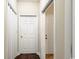 Functional hallway with multiple doors providing access to various rooms and closet space at 220 Portsmith Dr. # 2, Myrtle Beach, SC 29588