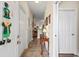 Charming hallway with neutral paint, leading to other rooms in the condo unit at 220 Portsmith Dr. # 2, Myrtle Beach, SC 29588