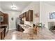 Kitchen view with dark cabinets, stainless steel appliances, and speckled countertops at 220 Portsmith Dr. # 2, Myrtle Beach, SC 29588