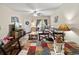 Comfortable living room with a ceiling fan, TV, and easy access to a balcony at 220 Portsmith Dr. # 2, Myrtle Beach, SC 29588