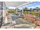 Wonderful backyard patio with lounge chairs and a pond view, great for relaxation and serenity at 223 Obi Lane, Surfside Beach, SC 29575