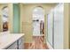 Bathroom featuring an enclosed glass shower, walk-in closet, and neutral color scheme at 223 Obi Lane, Surfside Beach, SC 29575